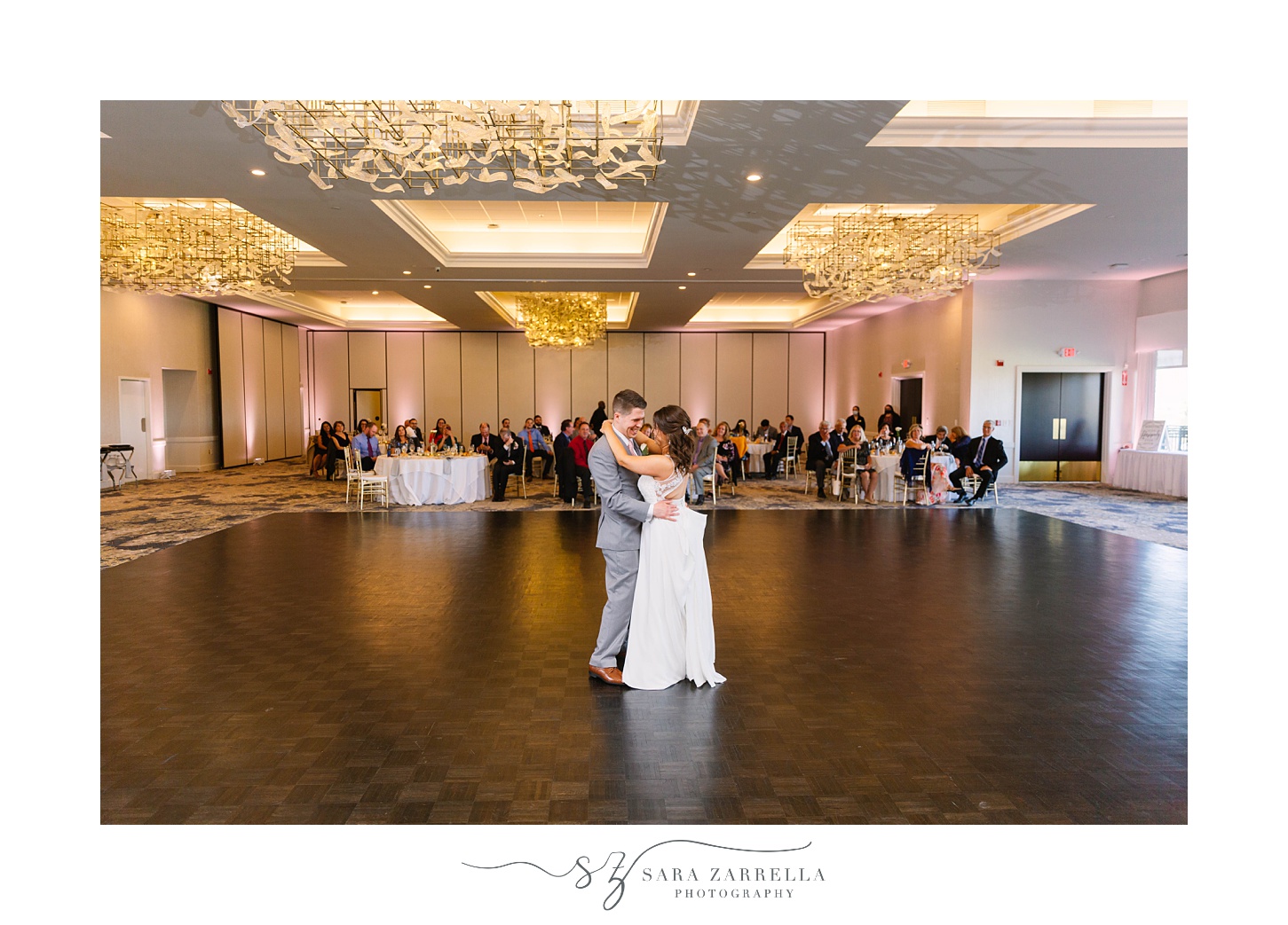 newlyweds first dance during ballroom reception at Kirkbrae Country Club
