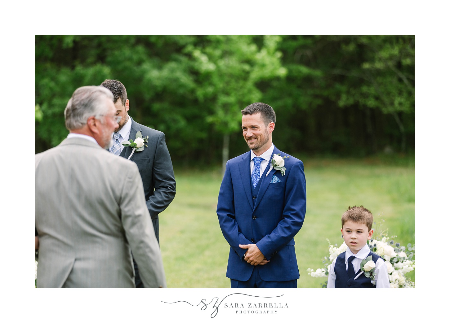 groom laughs during ceremony 
