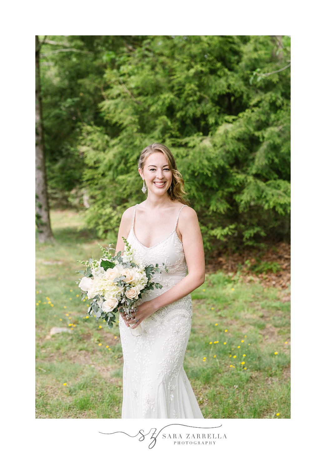 bride holds bouquet of white flowers in Foster RI