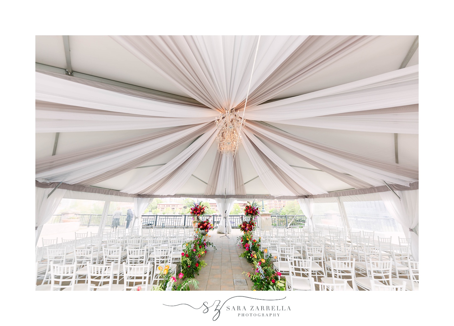 Skyline at Waterplace wedding ceremony with floral covered aisle