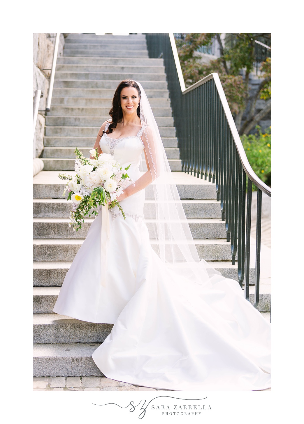 bride poses on steps in Providence RI 