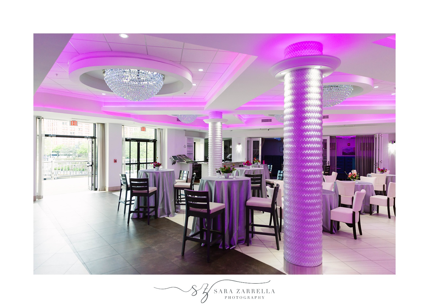 wedding reception in ballroom at Skyline at Waterplace with purple uplighting