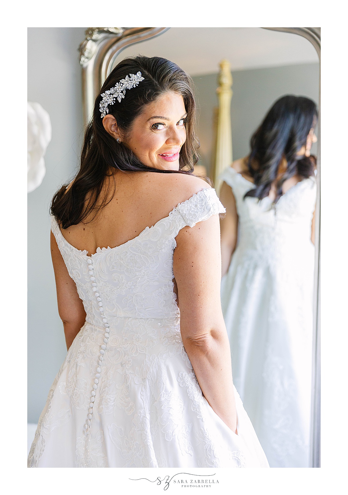 bride looks over shoulder before Alpine Country Club wedding 