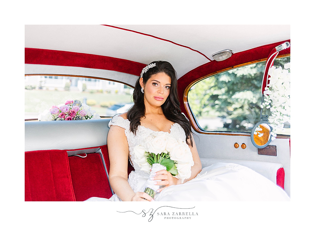 bride sits in classic Rolls Royce before Alpine Country Club wedding