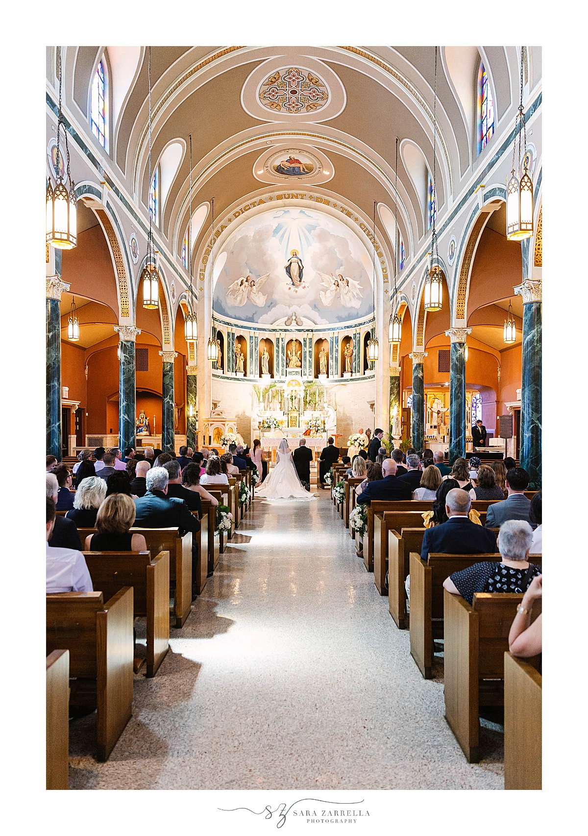 bride and groom give vows during traditional church wedding in Rhode Island