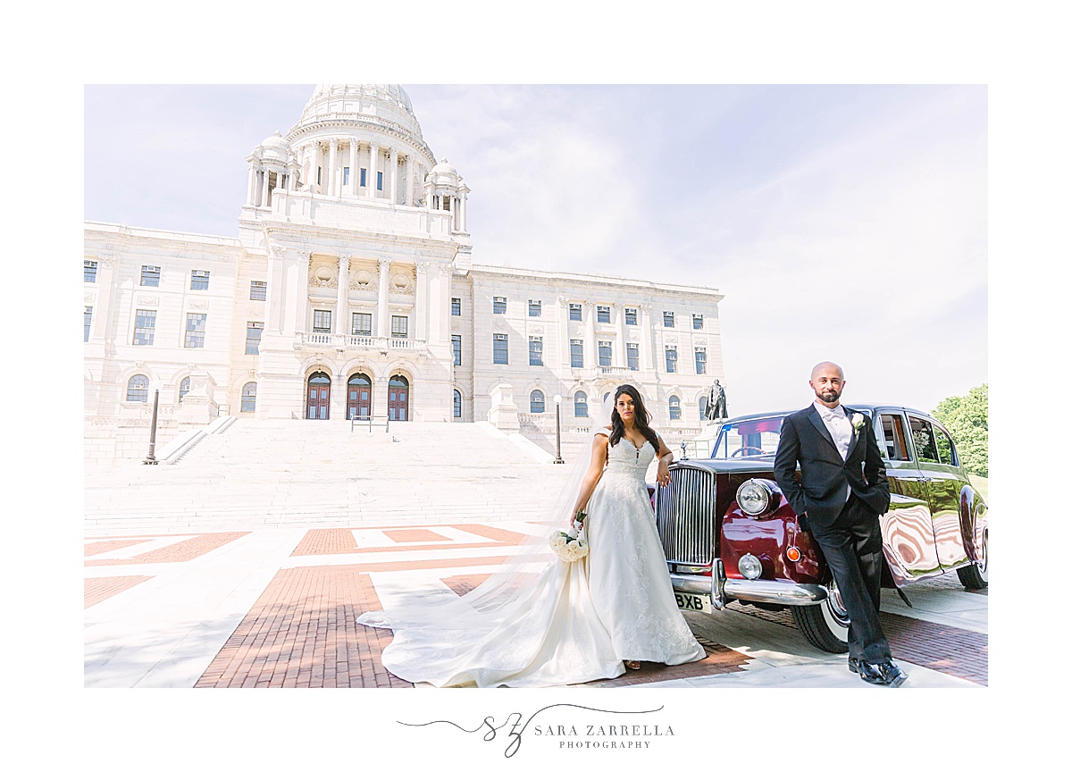 newlyweds pose outside of State House against classic Rolls Royce