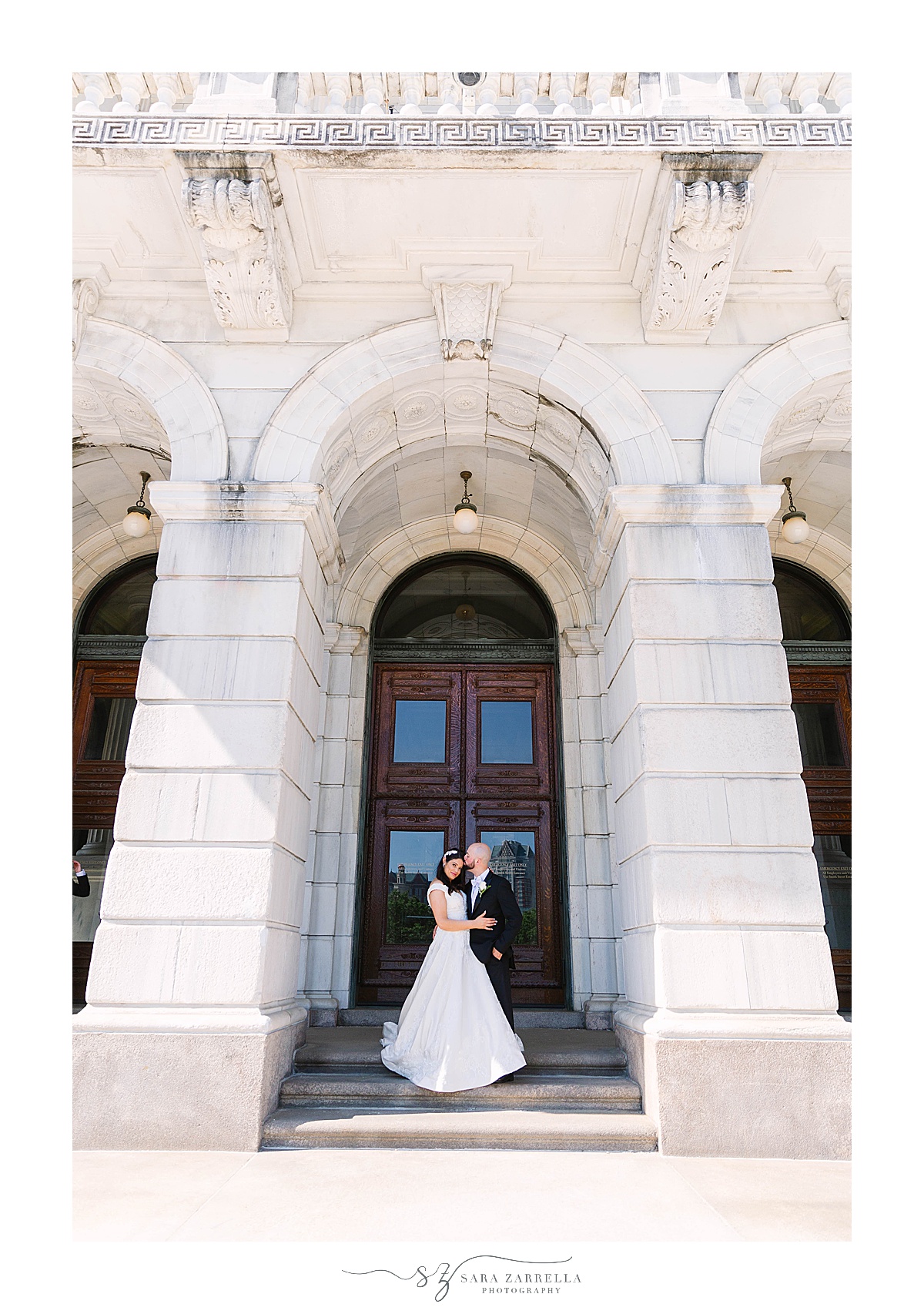 newlyweds pose on steps of State House in Rhode Island