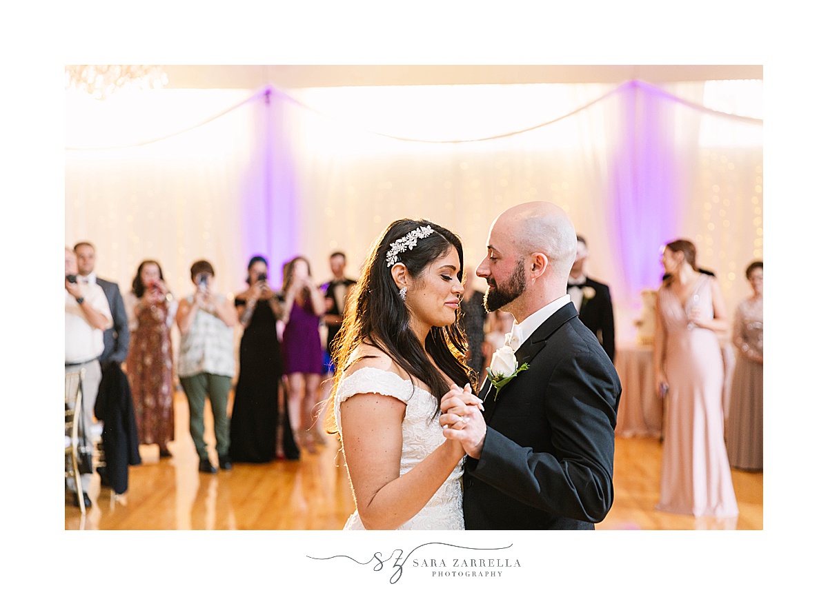 newlyweds have first dance during reception at  Alpine Country Club