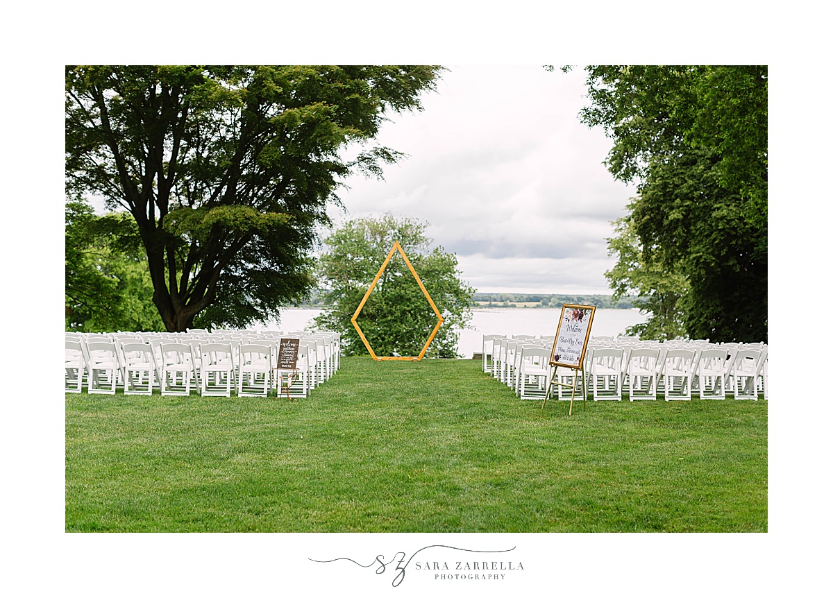 waterfront wedding ceremony with modern arbor at Glen Manor House