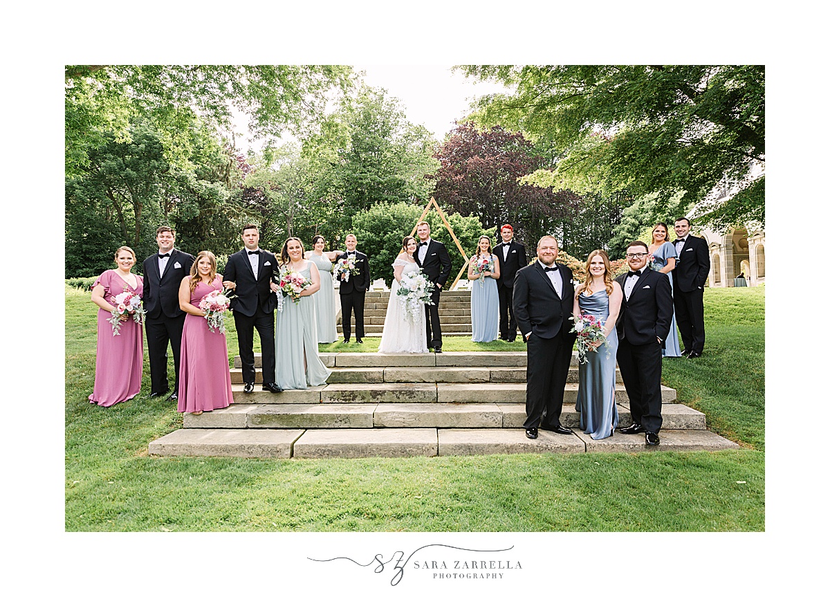 wedding party poses on steps at Glen Manor House