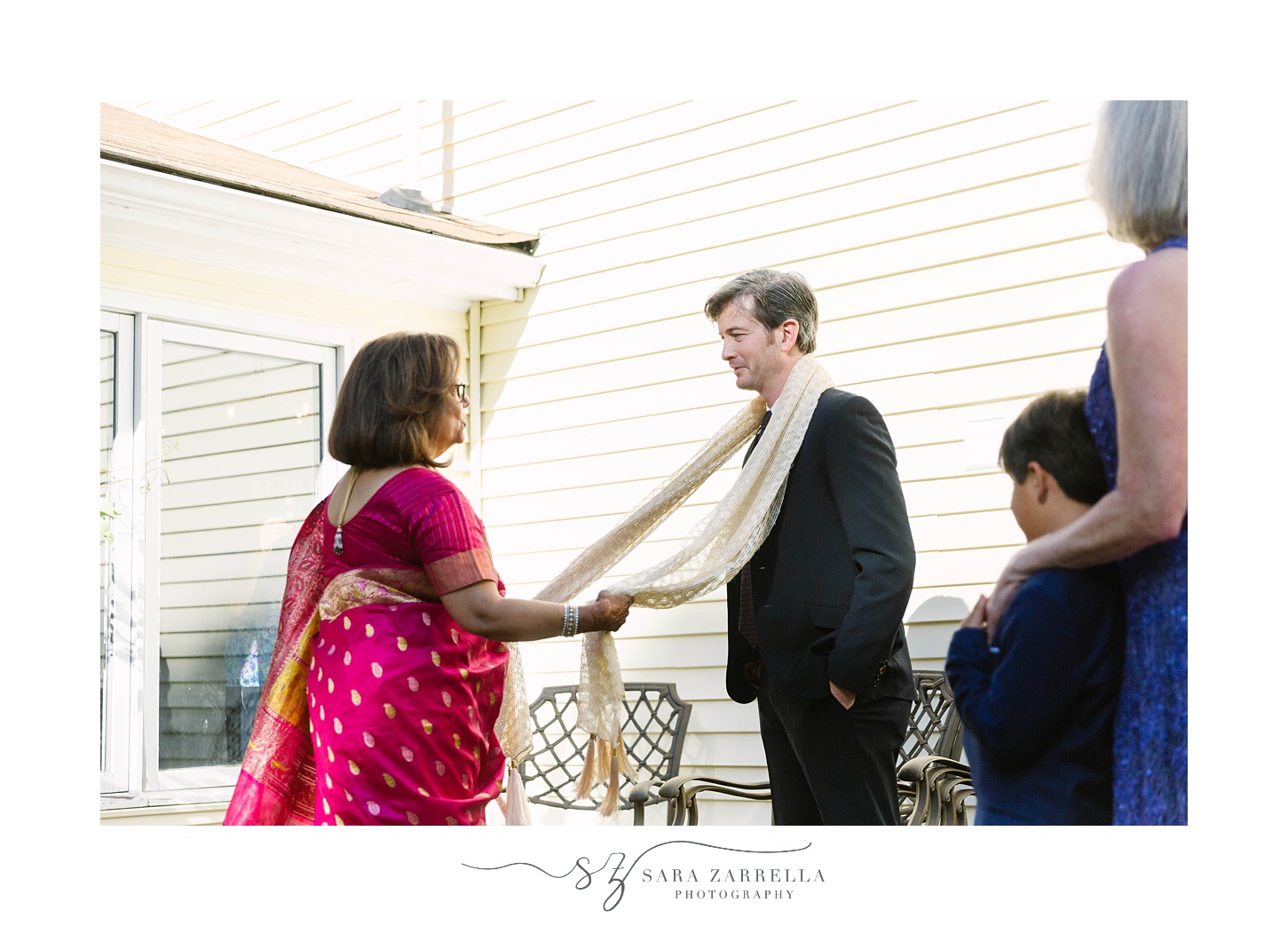 mother of the bride welcomes groom to home with traditional Hindu welcome