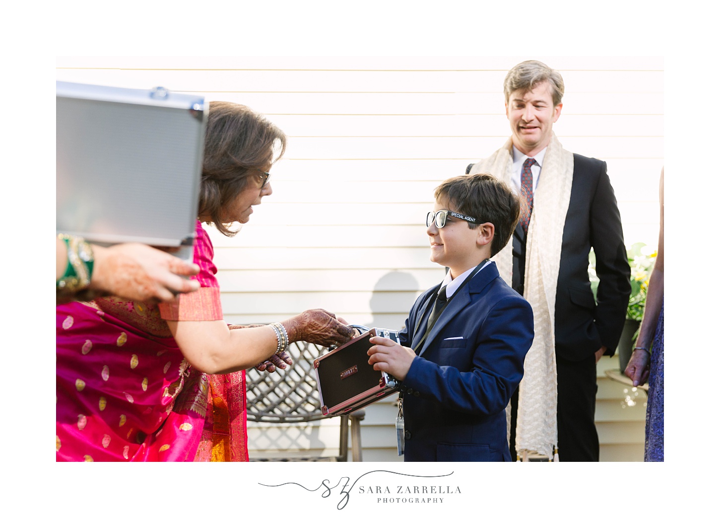 ring bearer gets box with rings for at home wedding