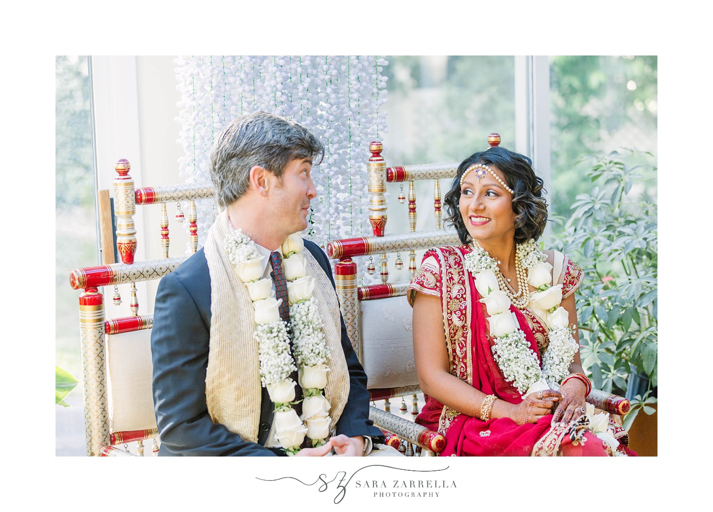 couple smiles during intimate Hindu wedding ceremony at home