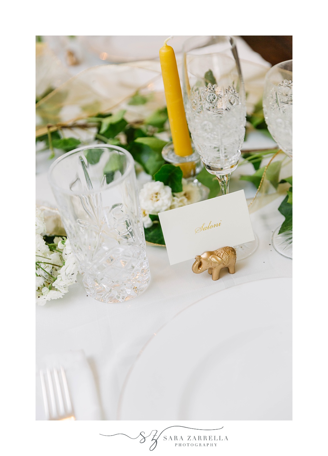 place settings with elephant card holders for Hindu wedding ceremony at home