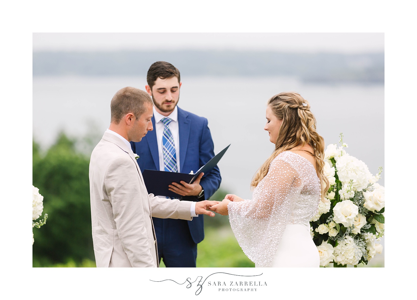 bride and groom exchange vows during wedding ceremony at OceanCliff Hotel