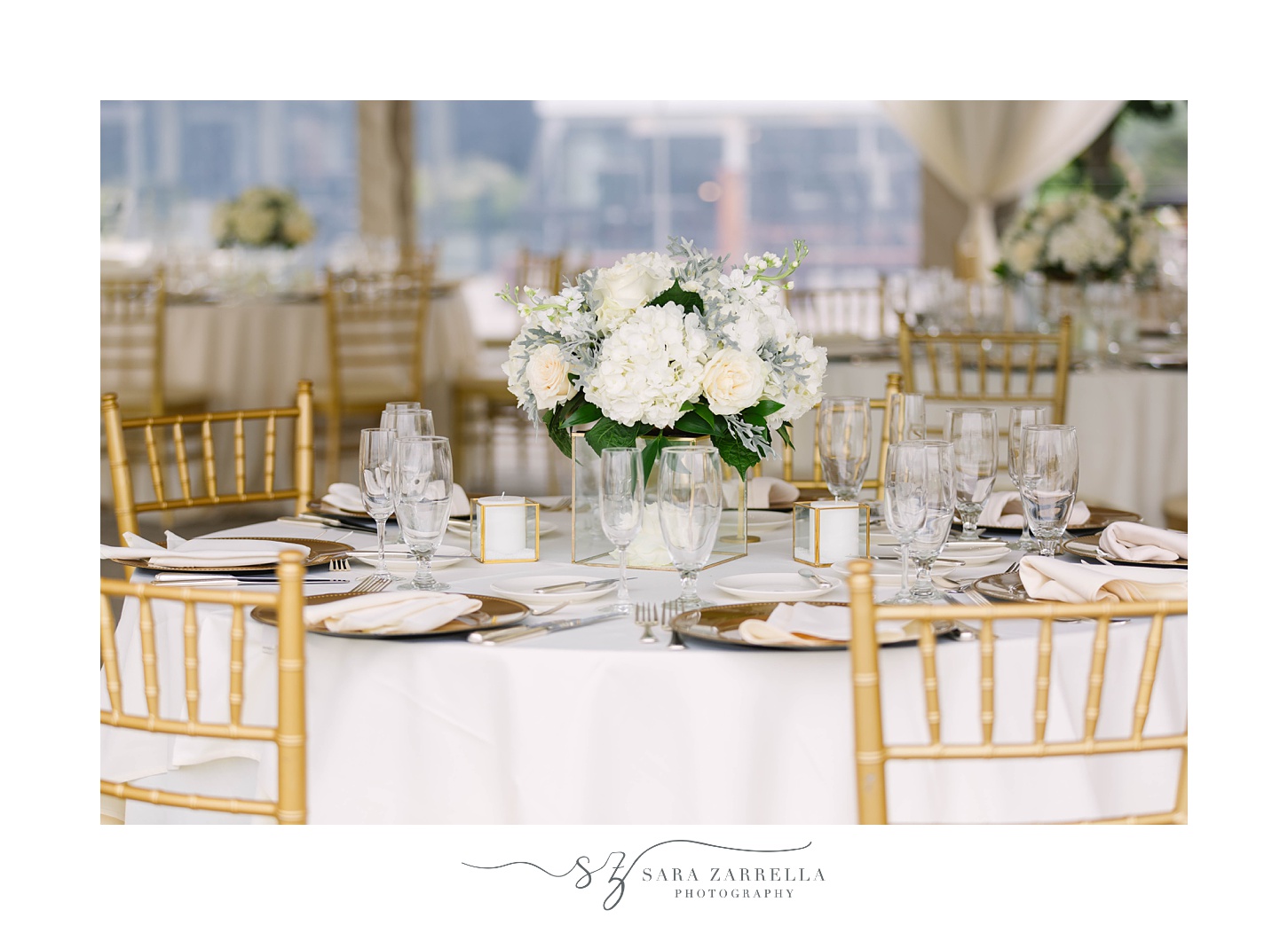 gold and white place settings for OceanCliff Hotel brunch wedding reception