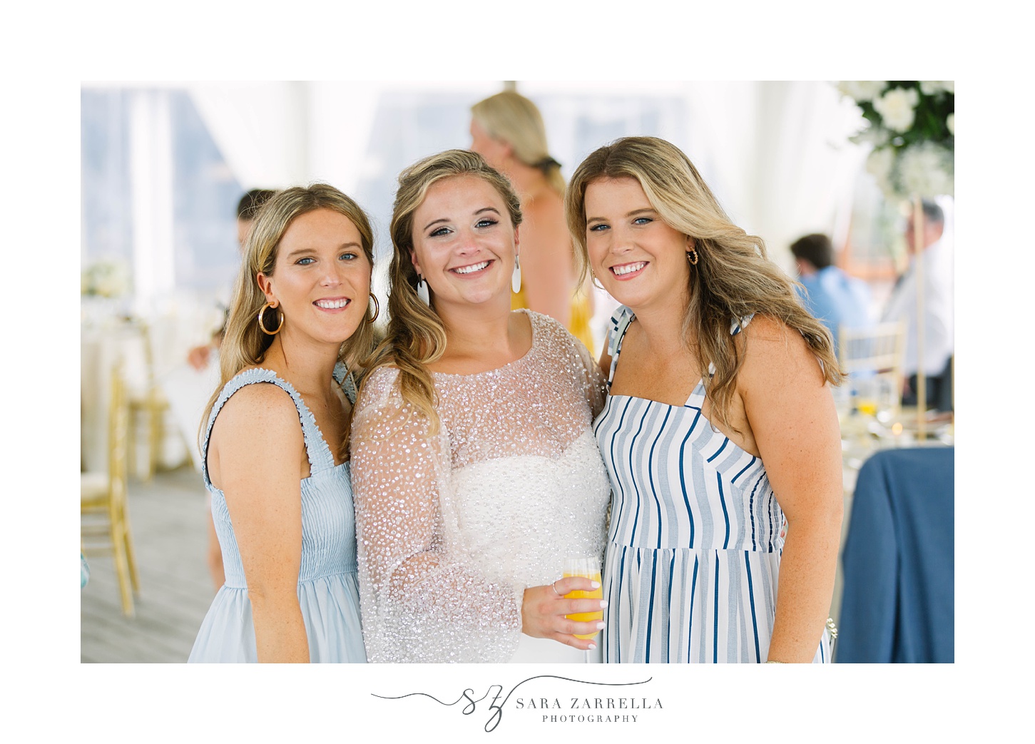 bride smiles with guests at OceanCliff Hotel brunch wedding reception