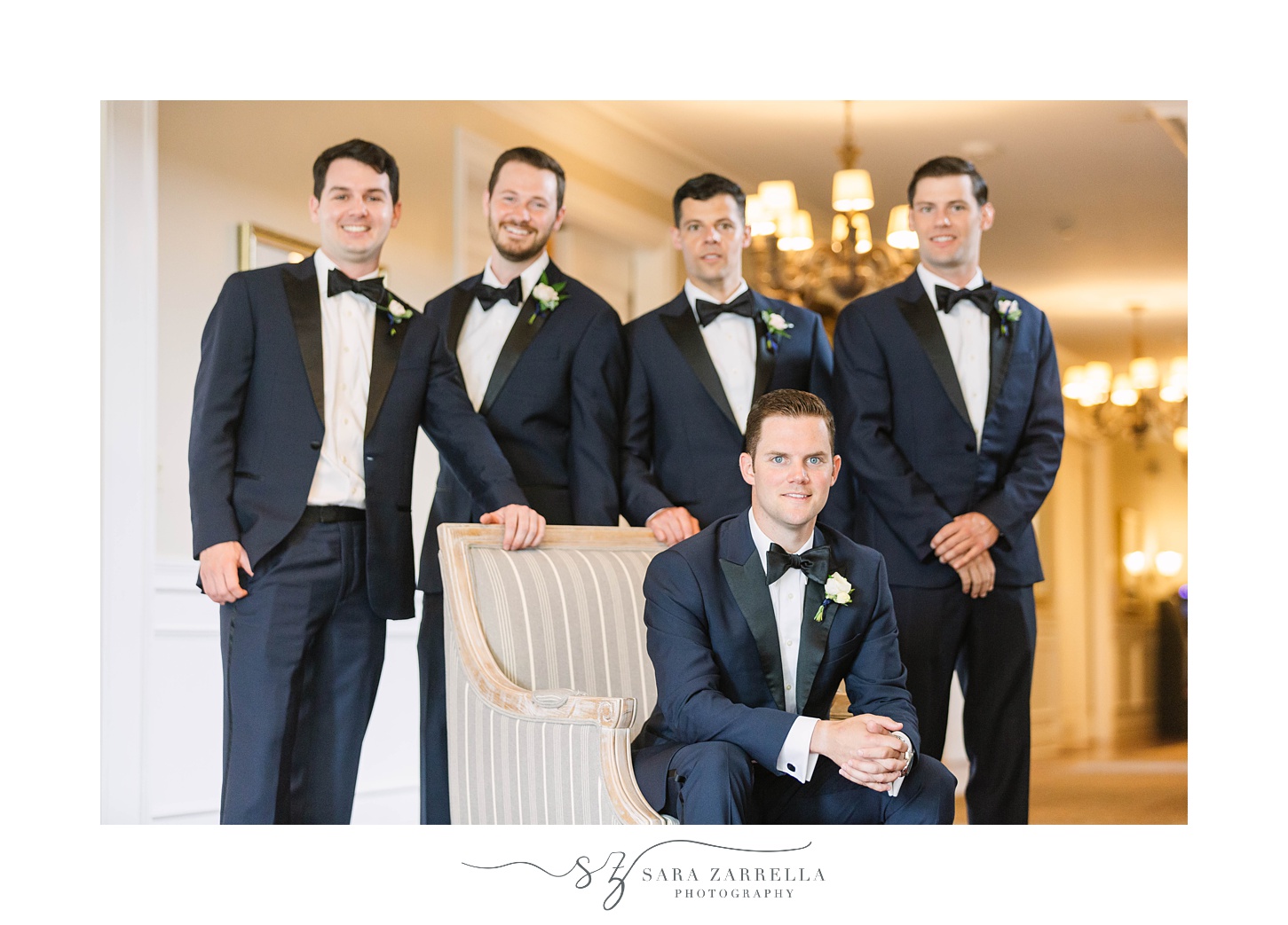 groom and groomsmen pose in Rhode Inland