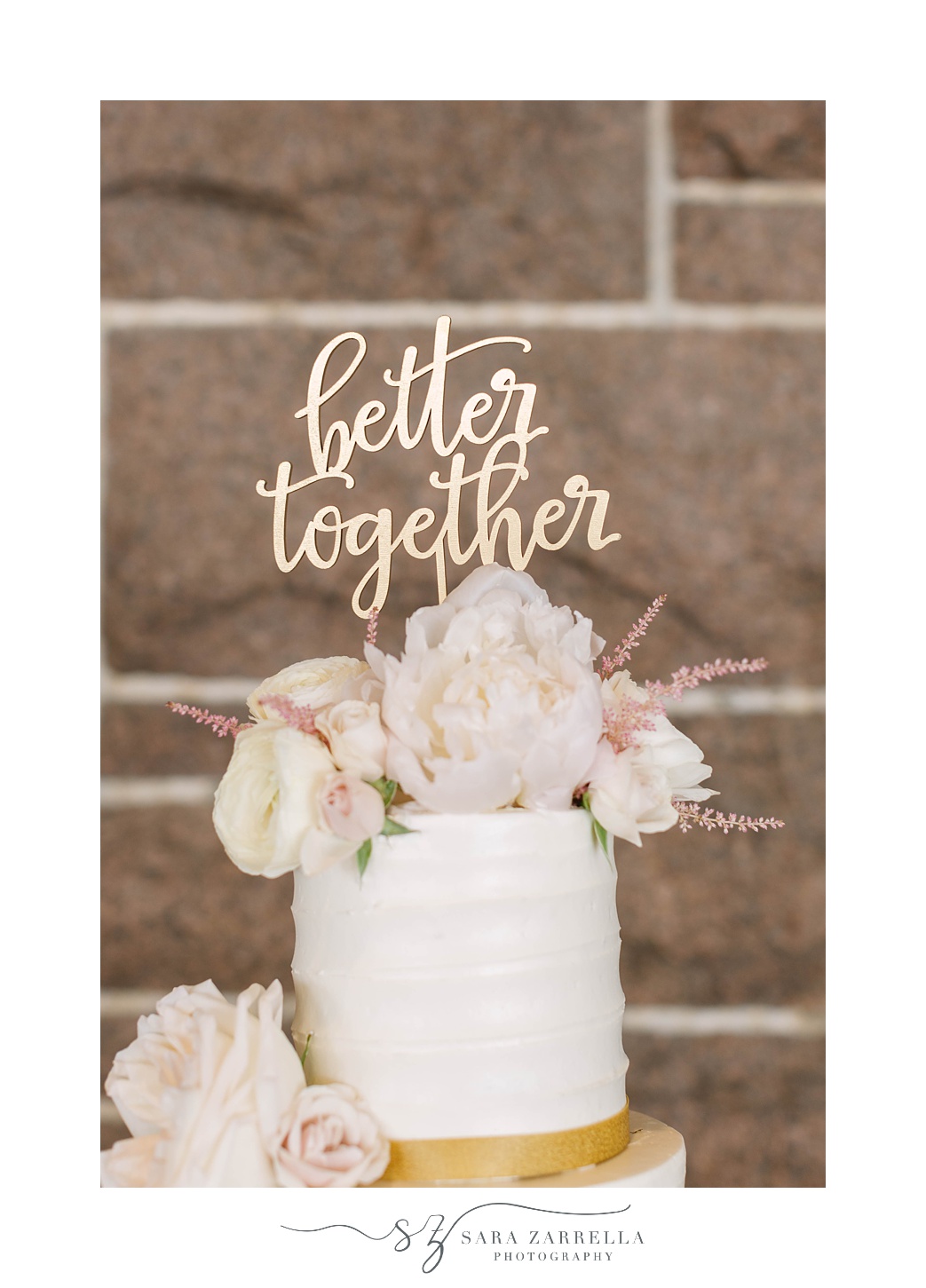 "better together" cake topper for tiered wedding cake with floral accents