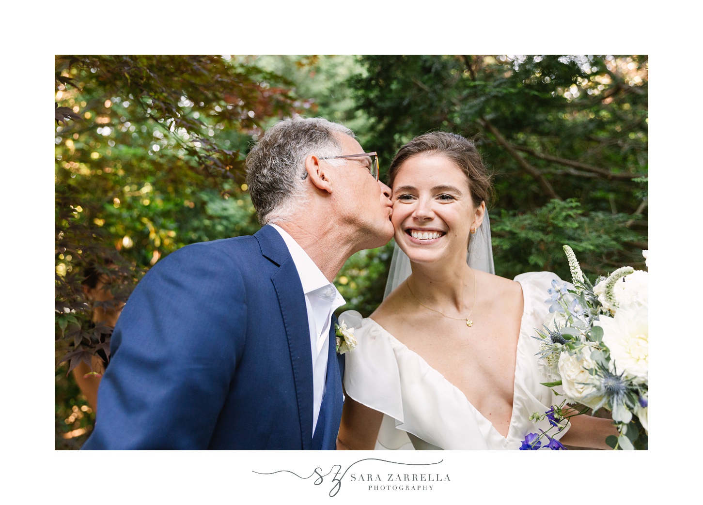 dad kisses bride's cheek during RI wedding day