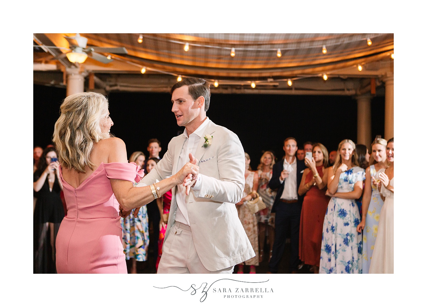 groom and mother dance together during Newport RI wedding reception