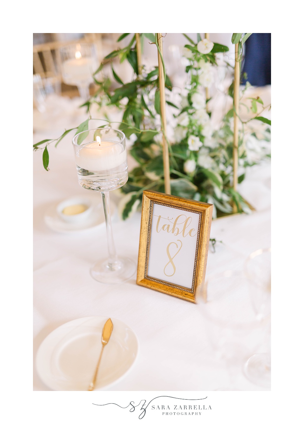 table numbers in gold frames