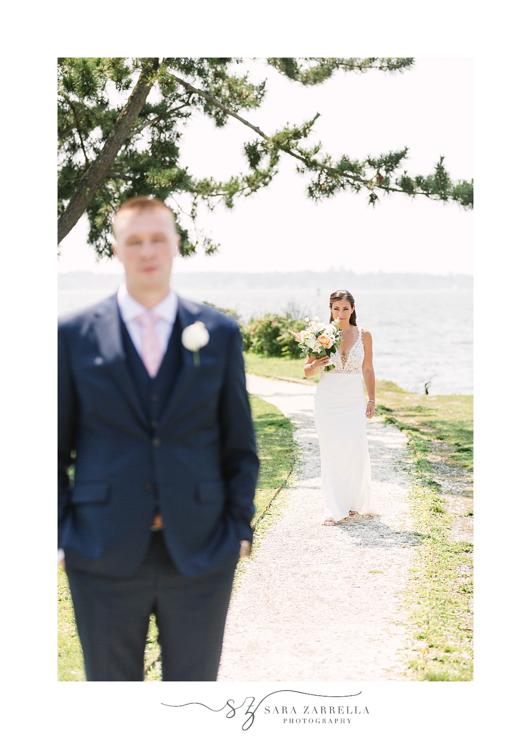 bride walks up to groom for first look during Gurney’s Newport Resort wedding day