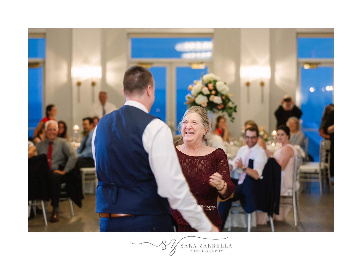 groom and mom laugh during dance at Newport RI wedding reception