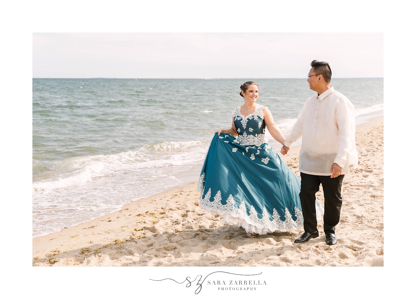 bride and groom walk along beach during Popponesset Inn wedding portraits 