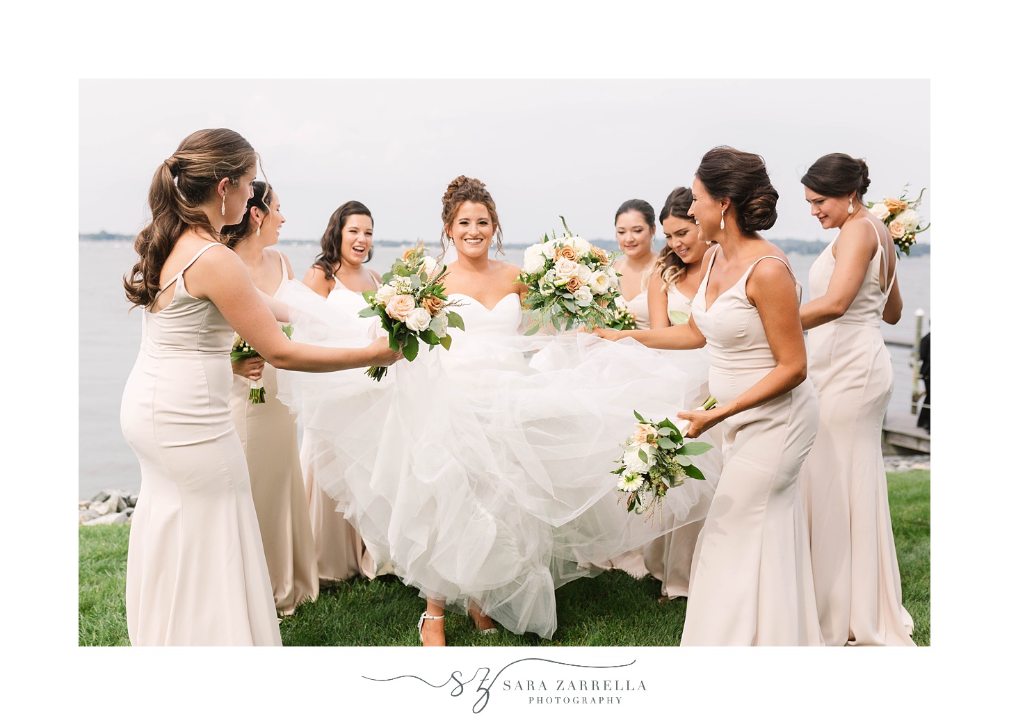bridesmaids help bride with gown at Lakeview Pavilion