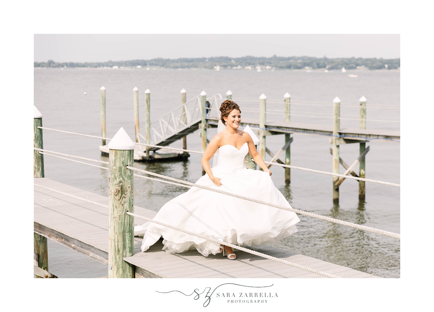 bride walks up dock at Lakeview Pavilion