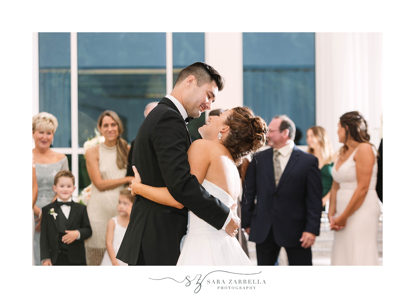 newlyweds dance together during Foxboro MA wedding reception