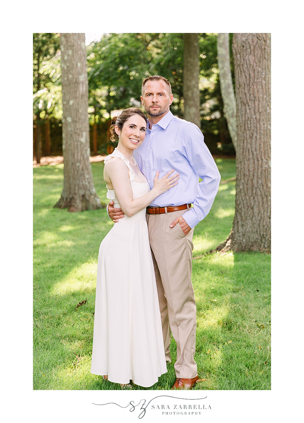 married couple hugs during portraits for The Chanler at Cliff Walk Vow Renewal