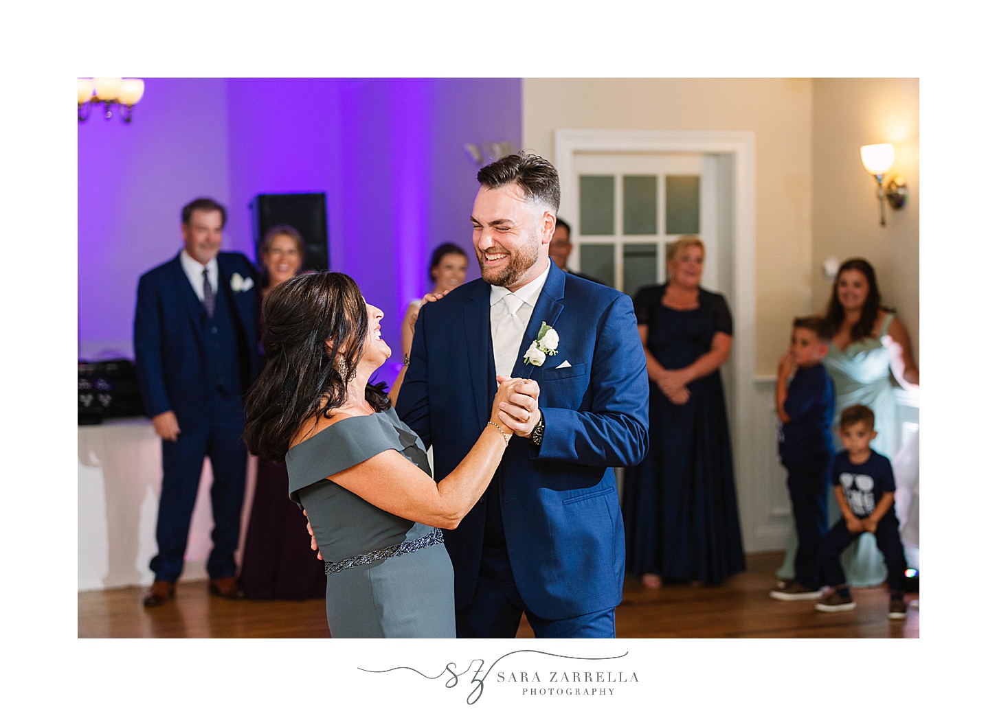 groom and mom dance together during Warwick RI wedding reception