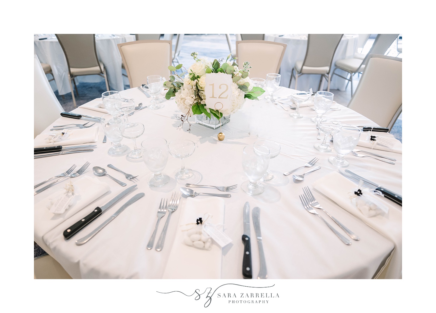 elegant gold and ivory place settings at  Quidnessett Country Club