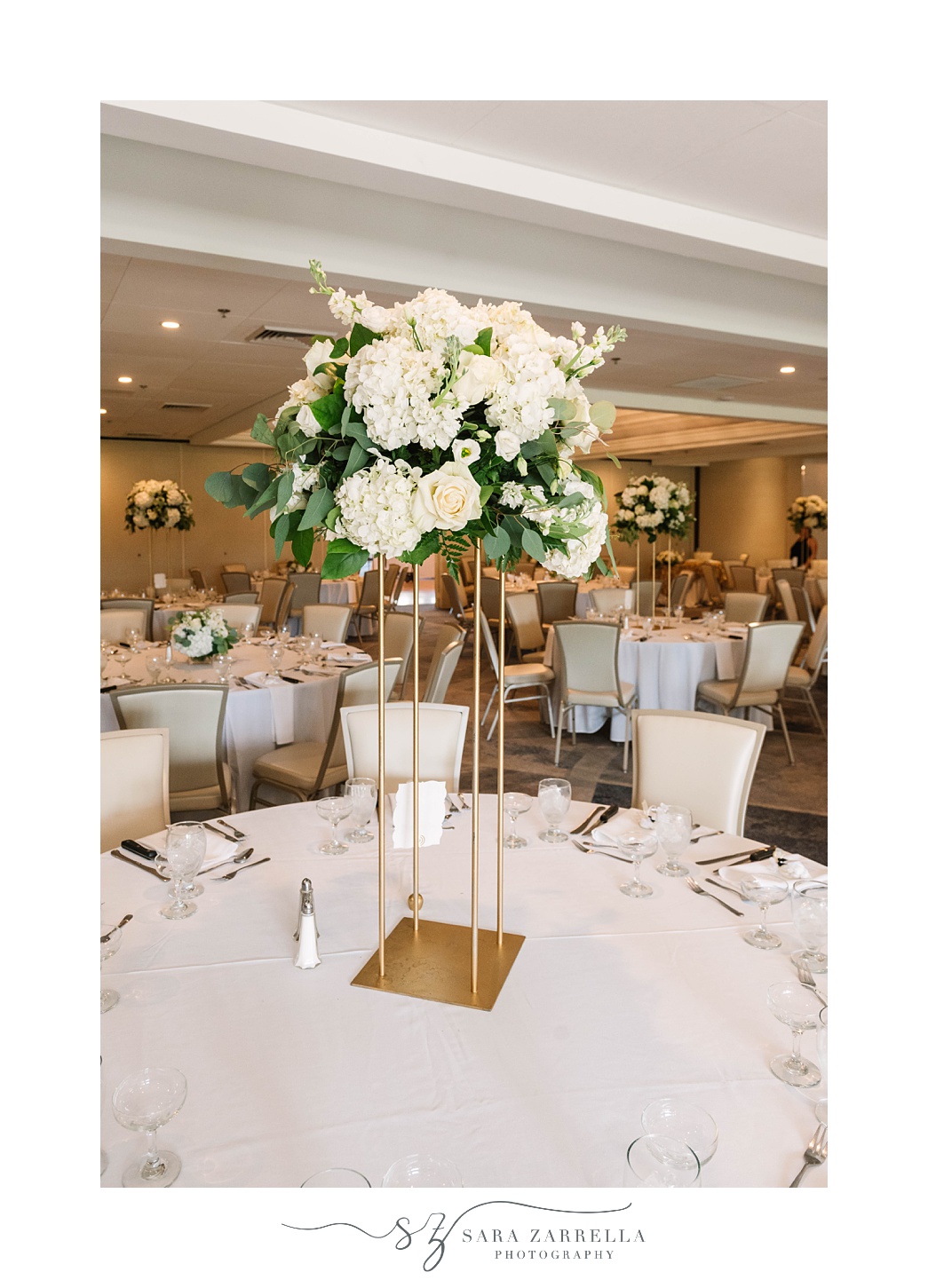 tall floral centerpieces at  Quidnessett Country Club