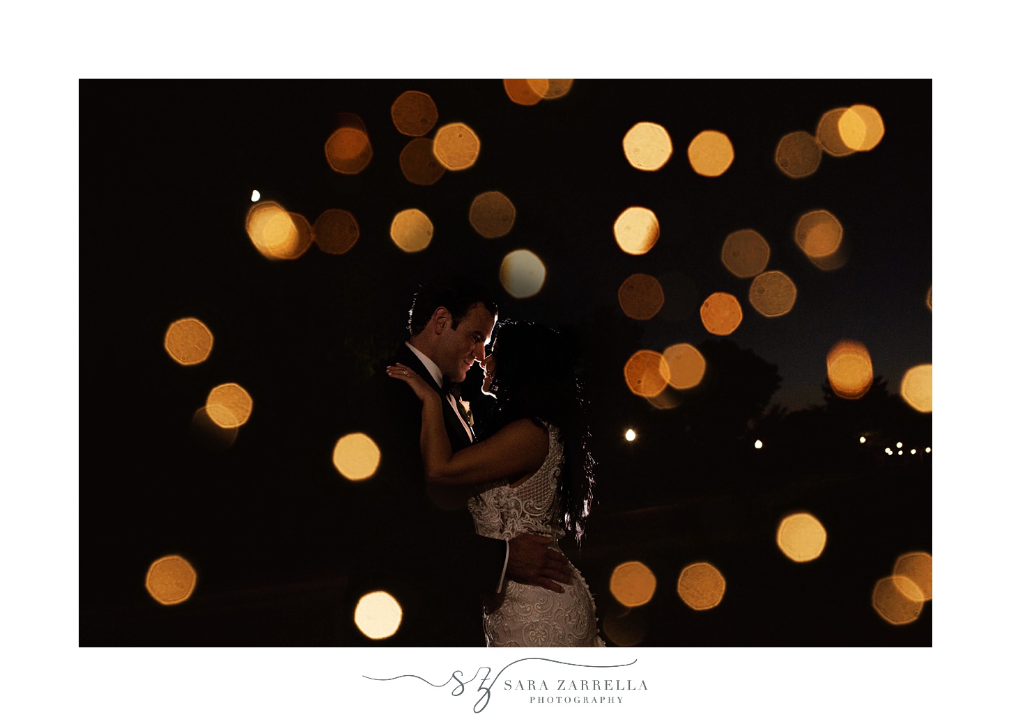 nighttime wedding portraits with glowing lights in North Kingstown RI