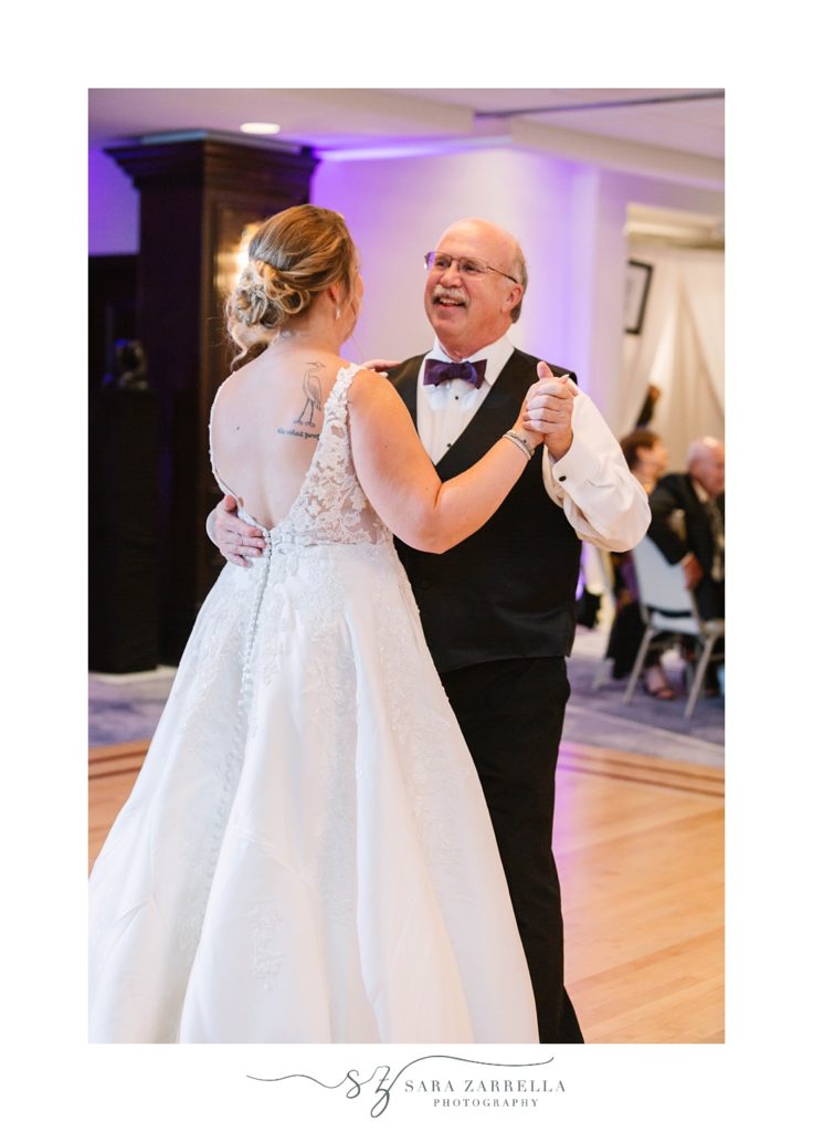 bride and dad laugh together during RI wedding