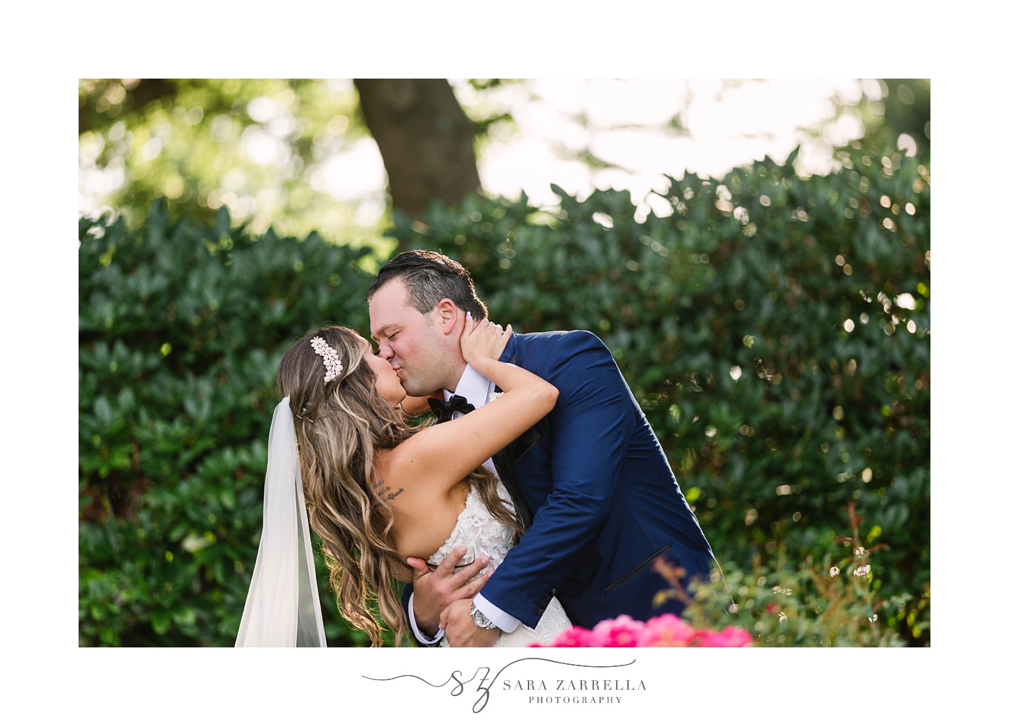 bride and groom kiss in gardens at Kirkbrae Country Club
