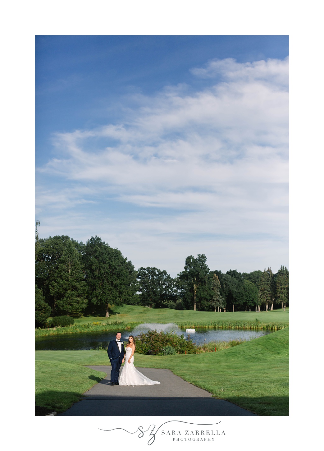 bride and groom stand together at Kirkbrae Country Club