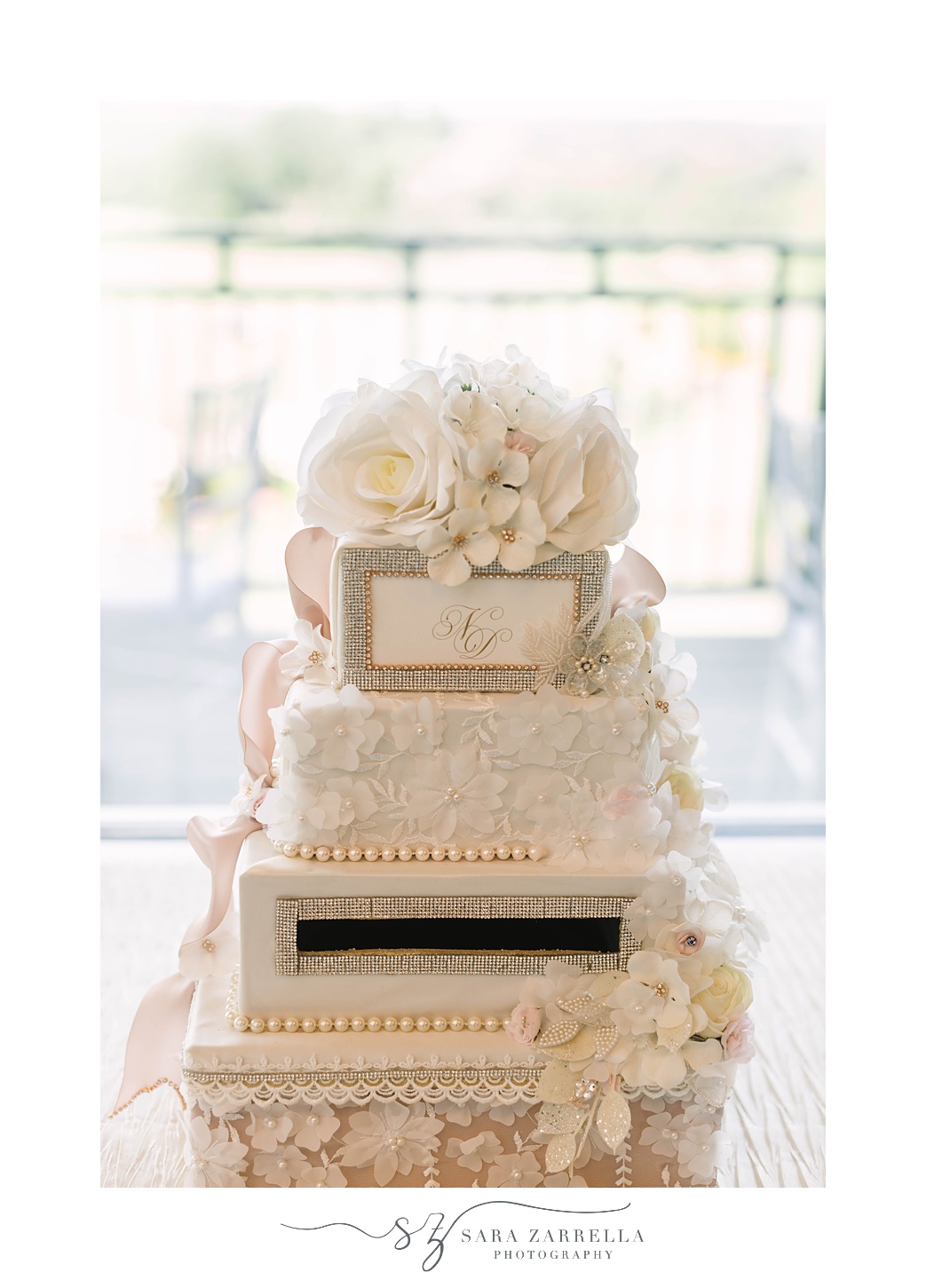 tiered wedding cake with floral accents 