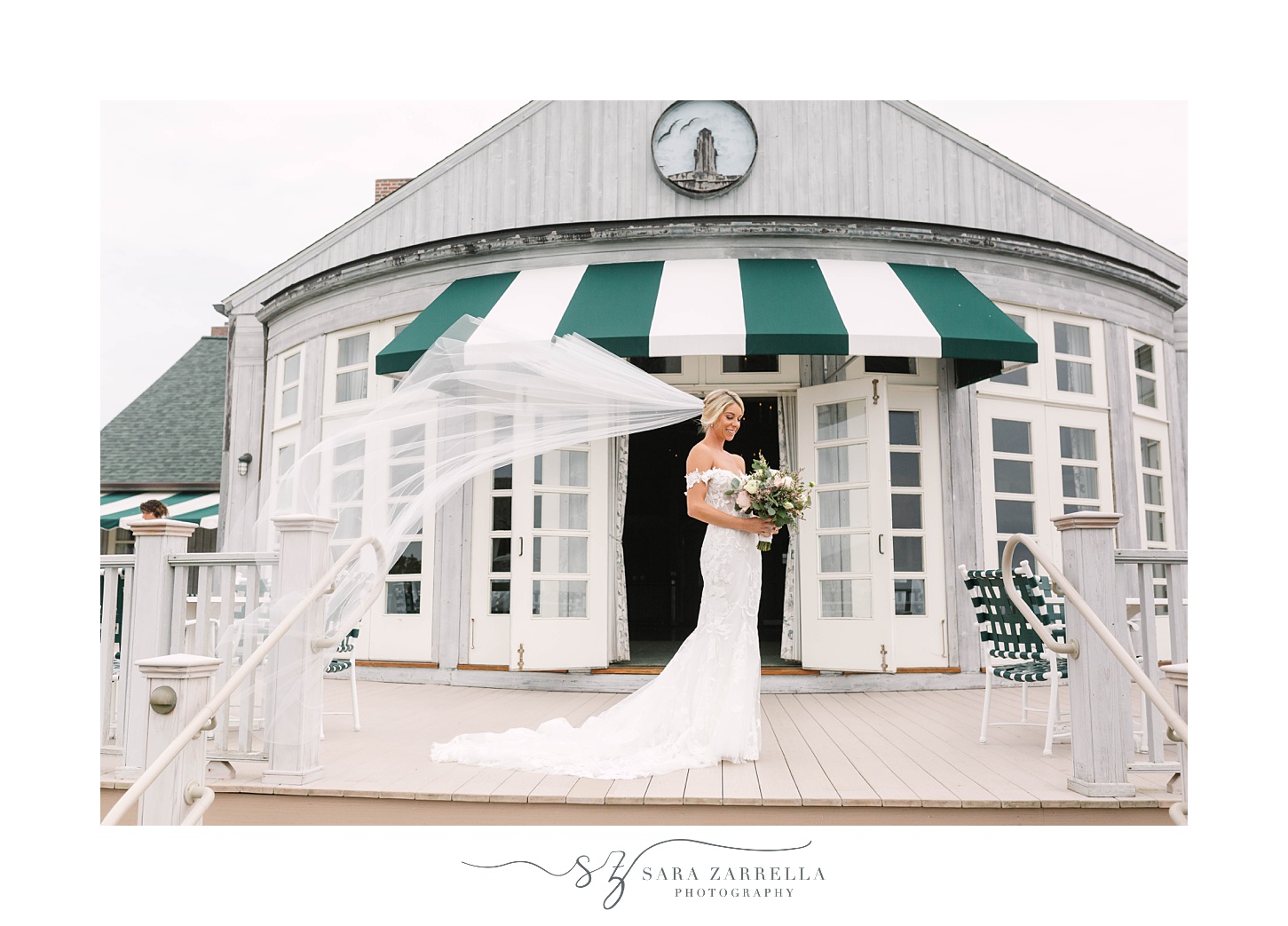 bride poses under green and white awning at The Dunes Club
