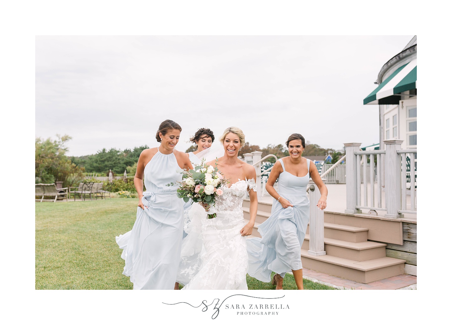 bride and bridesmaids walk by the Dunes Club before ceremony 