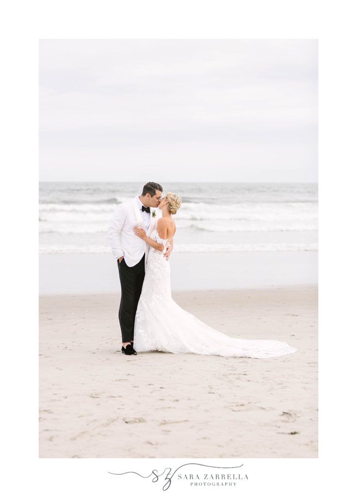 newlyweds kiss on Narragansett Bay beach