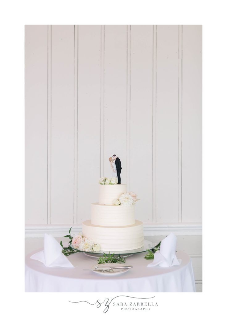 tiered wedding cake with newlyweds cake topper
