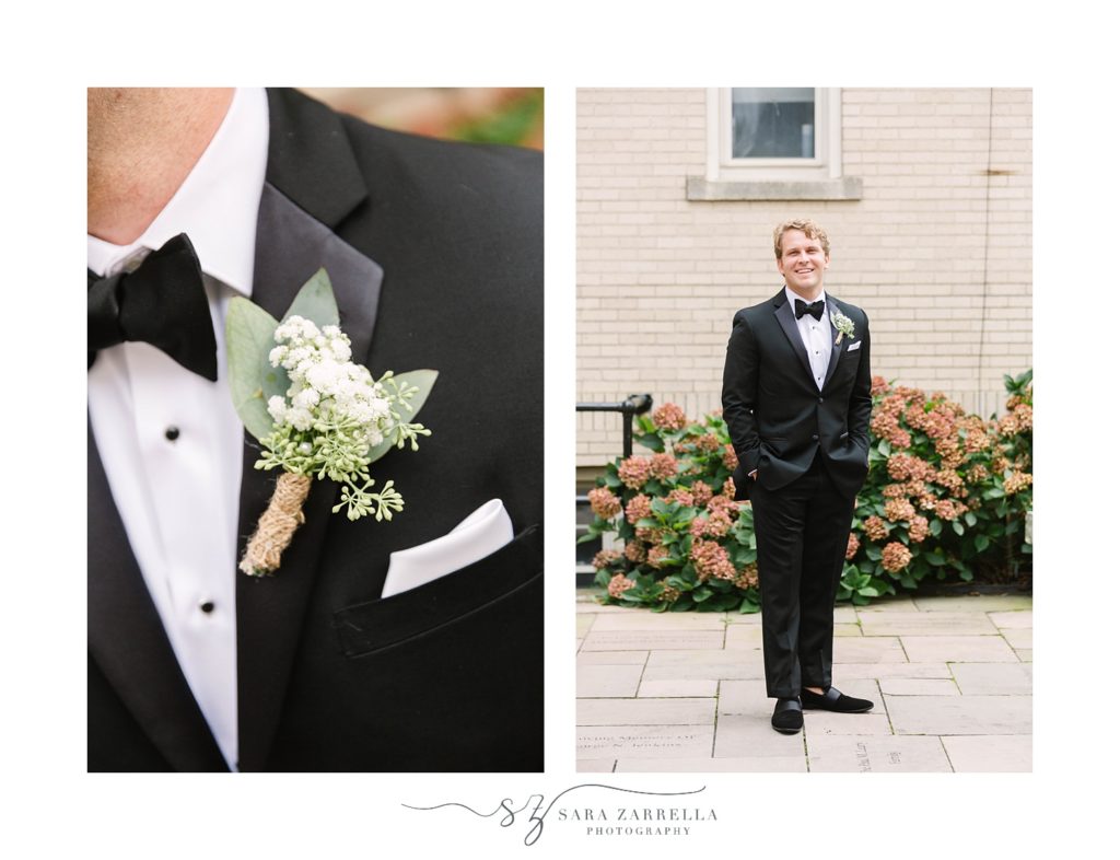 groom poses in classic black tux before Ochre Court wedding