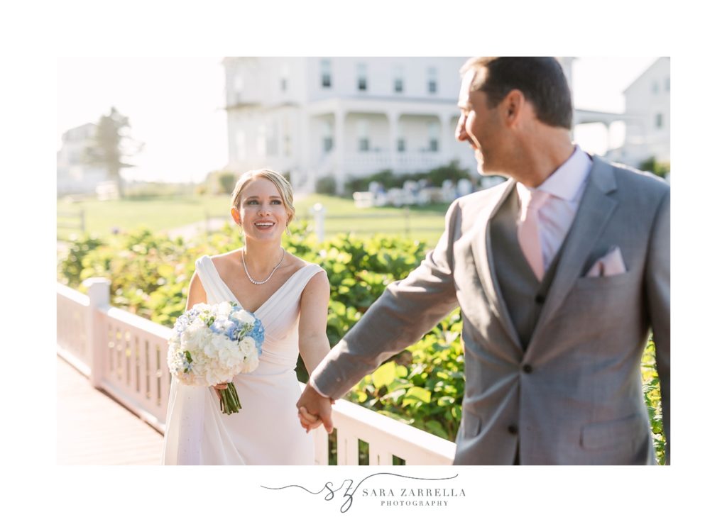 groom walks with bride outside the Spring House Hotel
