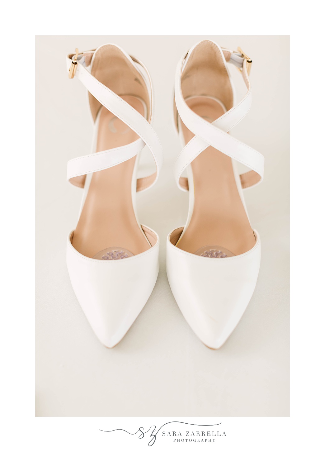 bride's white shoes for beach wedding at the Dunes Club