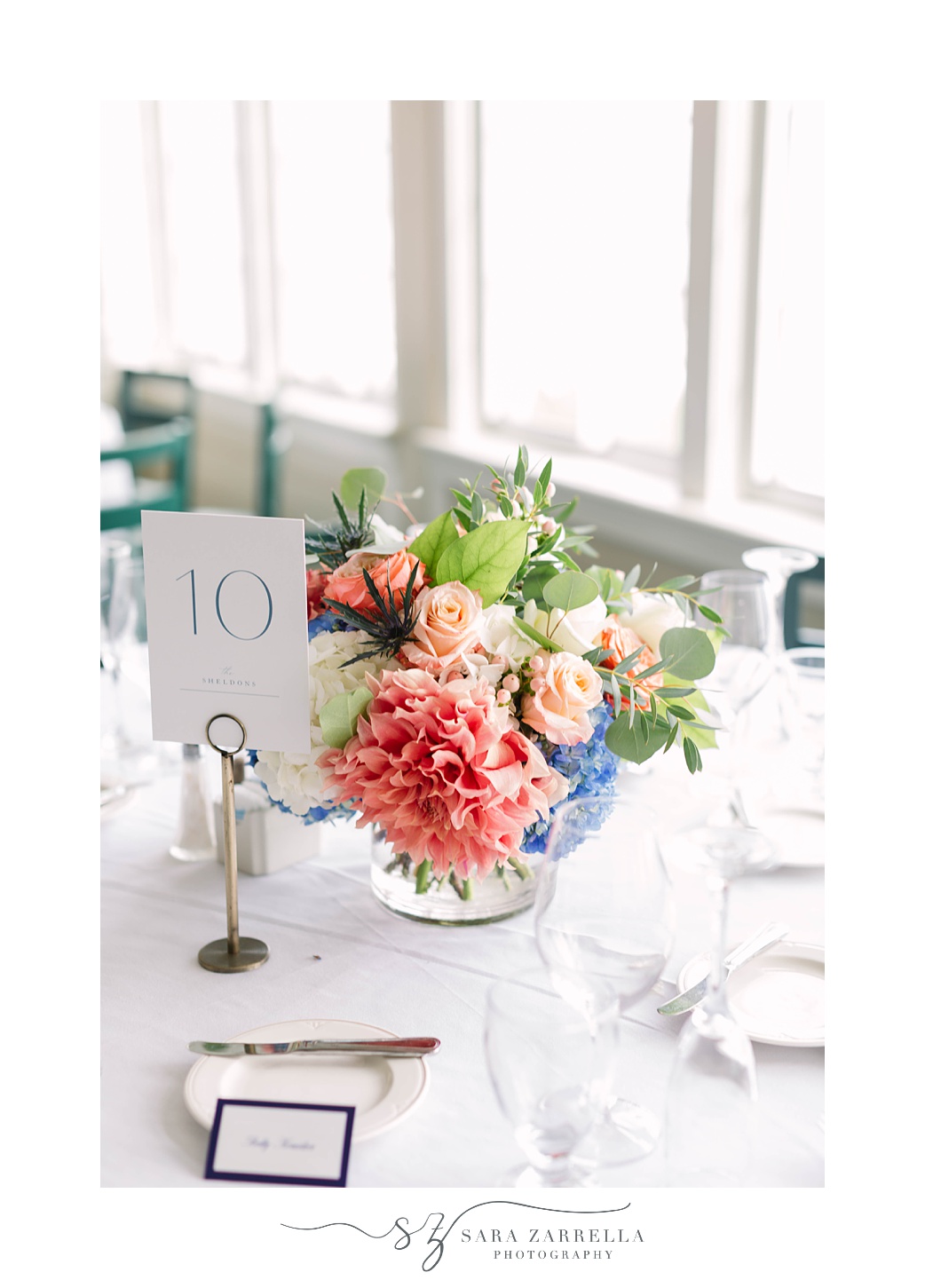 colorful floral centerpieces for The Dunes Club wedding reception