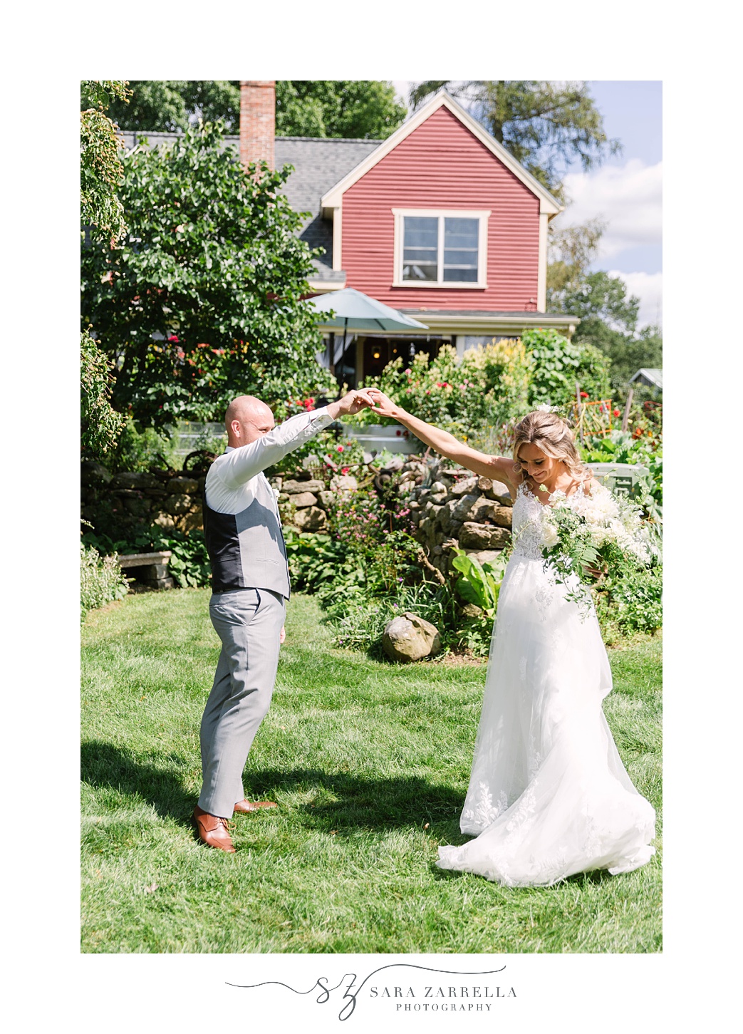 groom twirls bride during first look in Rhode Island